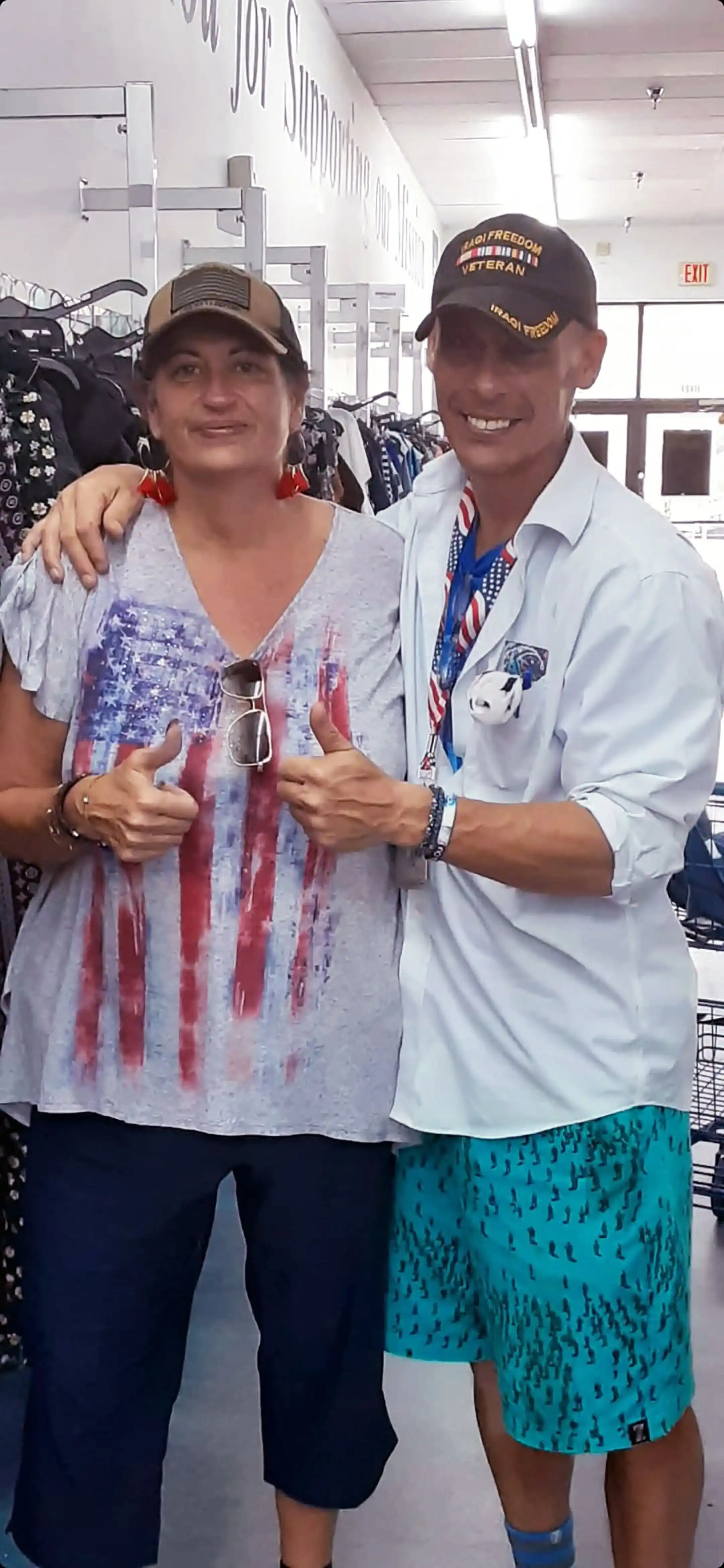 Authors David Haave and Rebecca Cinci give to the Goodwill donations supporting kids going back to school. -- David Haave